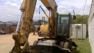 Caterpillar Mobilbagger M 318C CAT Bagger excavator Hydraulikbagger Baumaschinen Bilder gebraucht News Kleinanzeigen Baggerschaufel